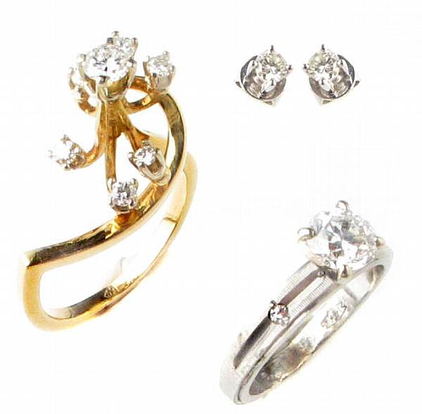 Appraisal: A collection of two diamond and gold rings and one