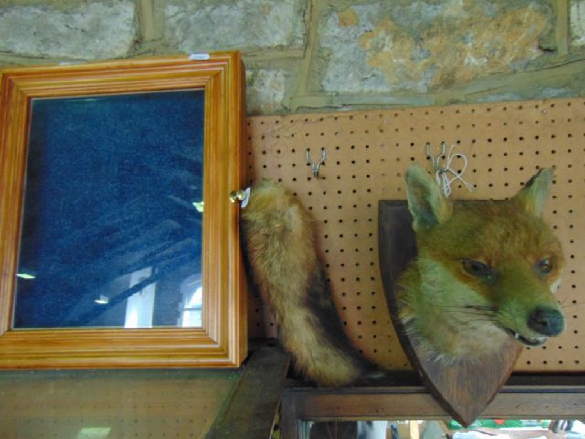 Appraisal: A taxidermy study of a fox mask inset amber glass