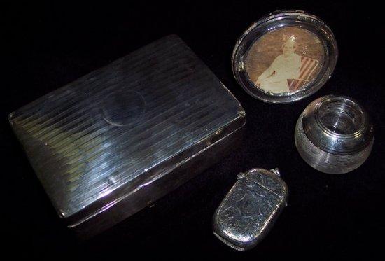 Appraisal: A cigarette box of rectangular form Birmingham an engraved vesta