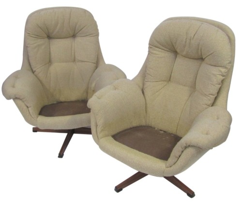 Appraisal: A pair of retro material egg chairs each with cream