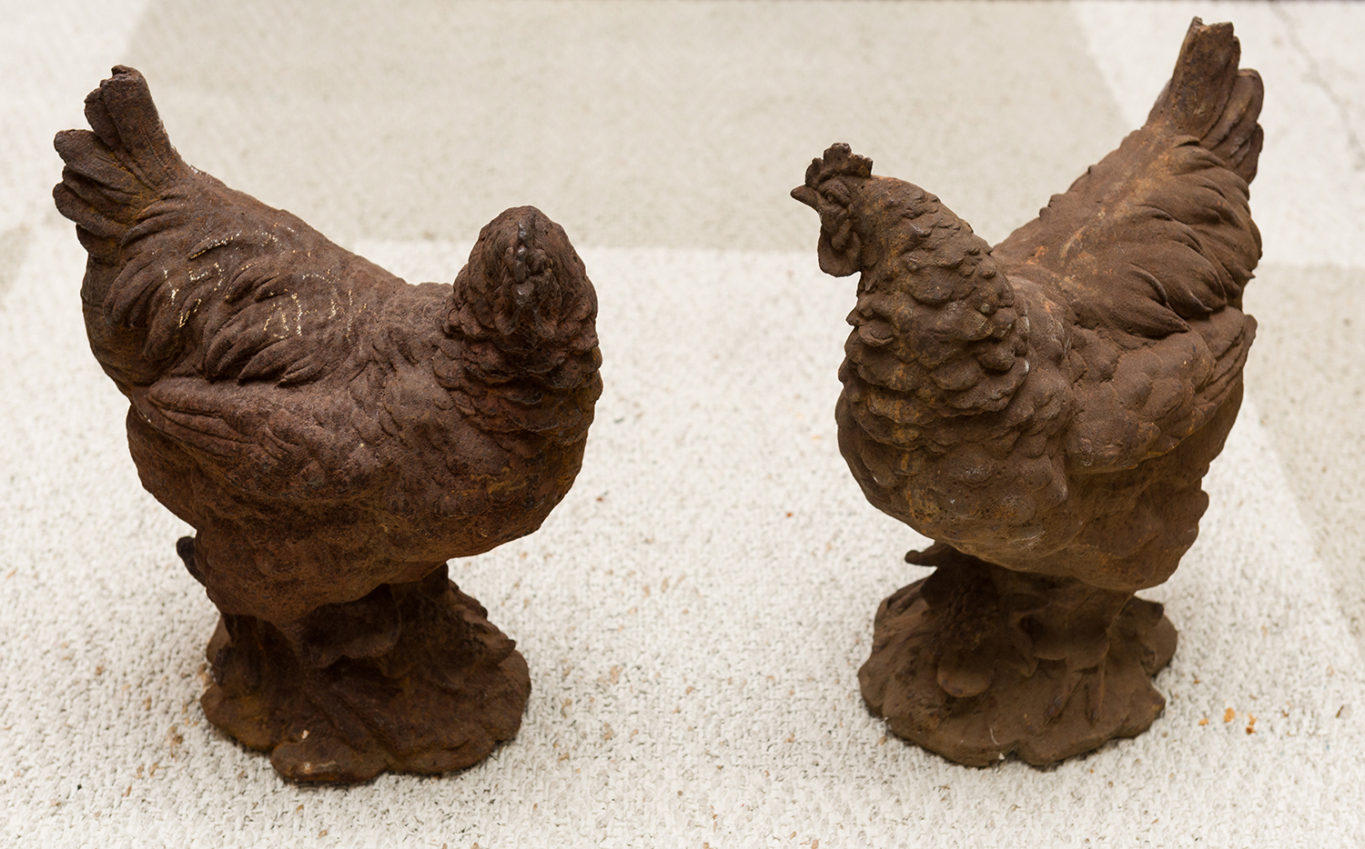 Appraisal: TWO CHARMING CAST IRON CHICKENS WITH RUSTED FINISH h x