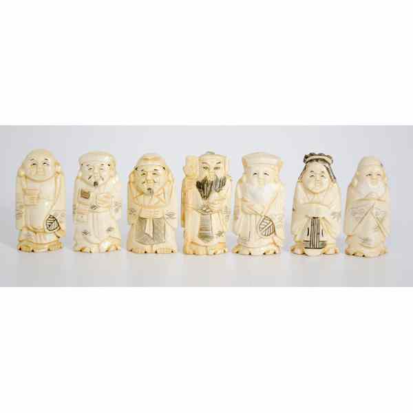 Appraisal: Japanese Ivory Carved Figures A group of seven carved and