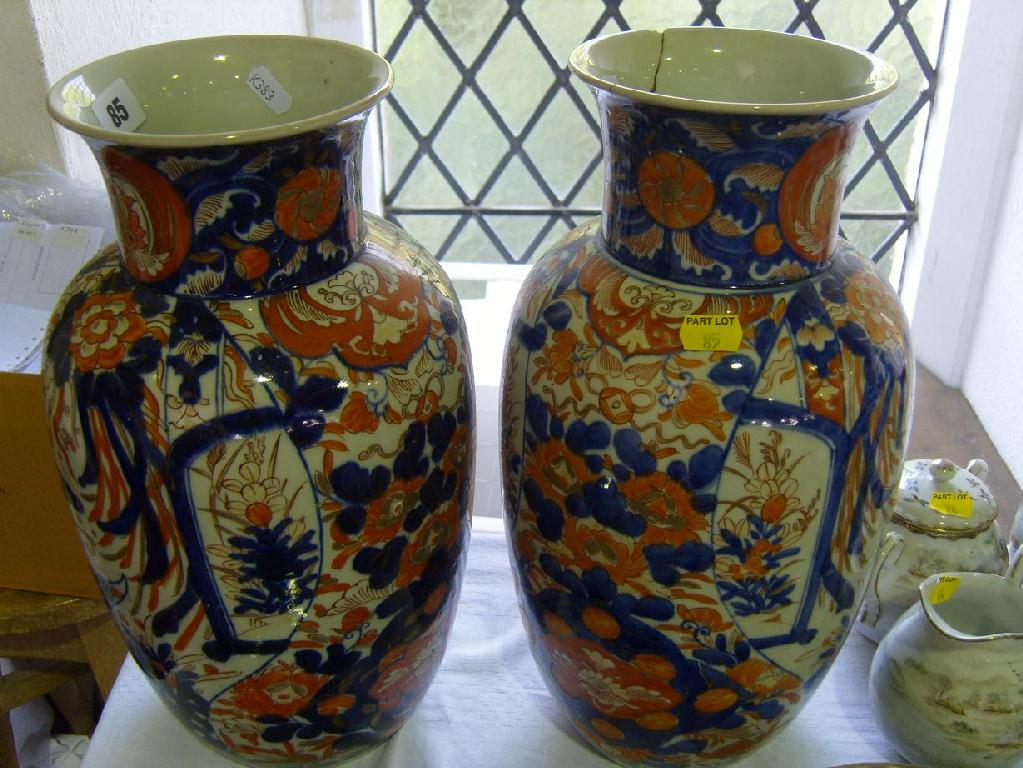 Appraisal: A matched pair of th century Imari vases with floral