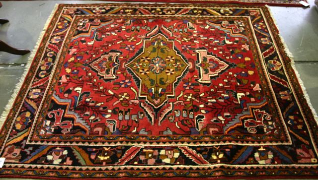 Appraisal: A Persian wool carpet cm long cm wide