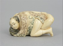 Appraisal: A Carved Ivory Netsuke of a Loving Couple ca th