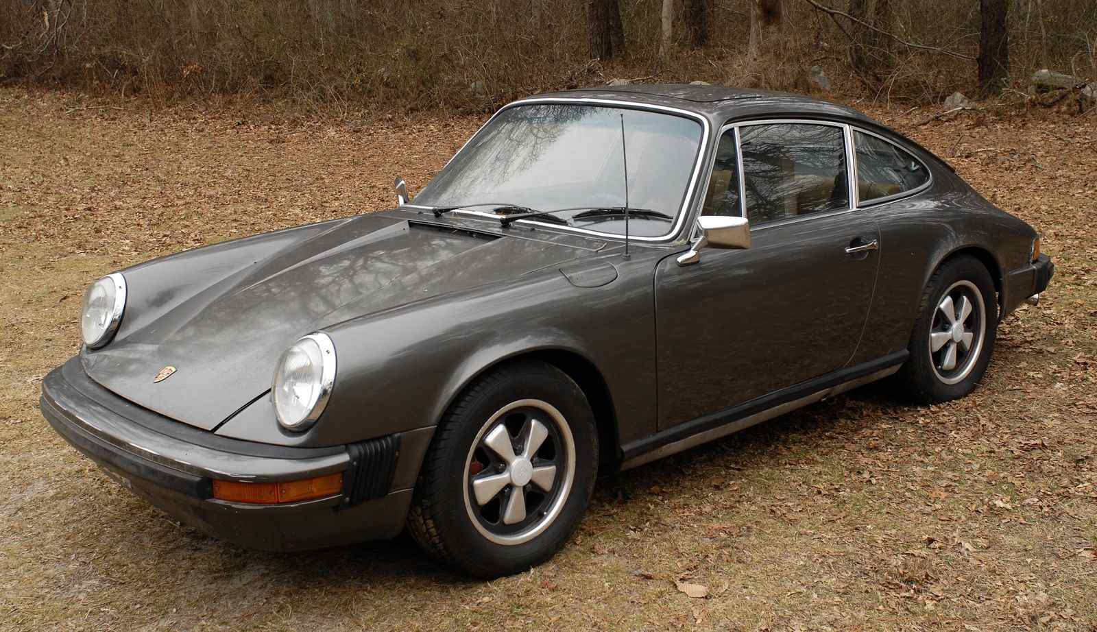 Appraisal: PORSCHE TWO-DOOR COUPE In gray Four-passenger Sunroof cylinder five-speed engine