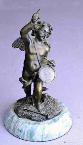 Appraisal: BRONZE CHERUB WITH DRUM AND STICKSFinely crafted bronze cherub on