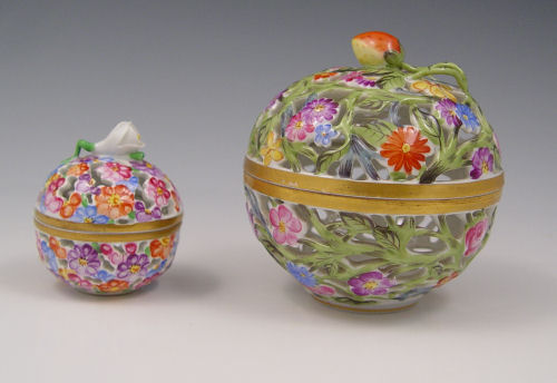 Appraisal: HEREND HUNGARIAN PORCELAIN RETICULATED COVERED JARS potpourri jars Strawberry finial