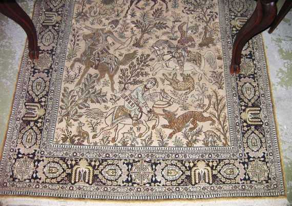 Appraisal: GHOM SILK old Beige central field depicting a hunting scene