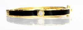 Appraisal: An ct gold black coral and diamond set bangle estimated