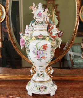 Appraisal: GERMAN DRESDEN STYLE PORCELAIN CAPPED URN ON PLINTH HAVING FIGURAL