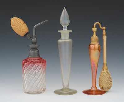 Appraisal: Three Art Glass Perfume Bottles Including a Steuben iridescent glass