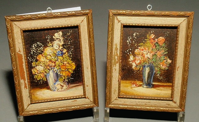 Appraisal: Pair of oil on board still life paintings of flowers