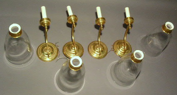 Appraisal: Set of four brass wall sconces with hurricane globes electrified