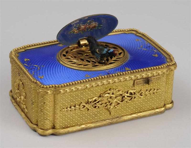 Appraisal: FRENCH GILT-BRONZE AND BLUE-GROUND ENAMEL BIRD MUSIC BOX The oval