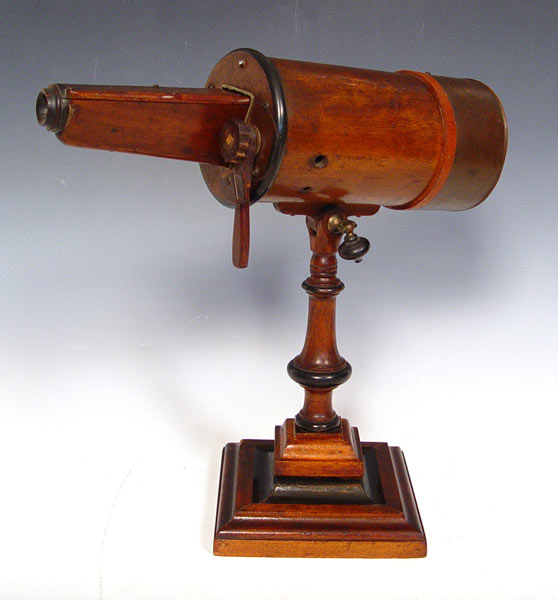 Appraisal: TH CENTURY WOOD KALEIDOSCOPE ON STAND Glass turns via ratchet