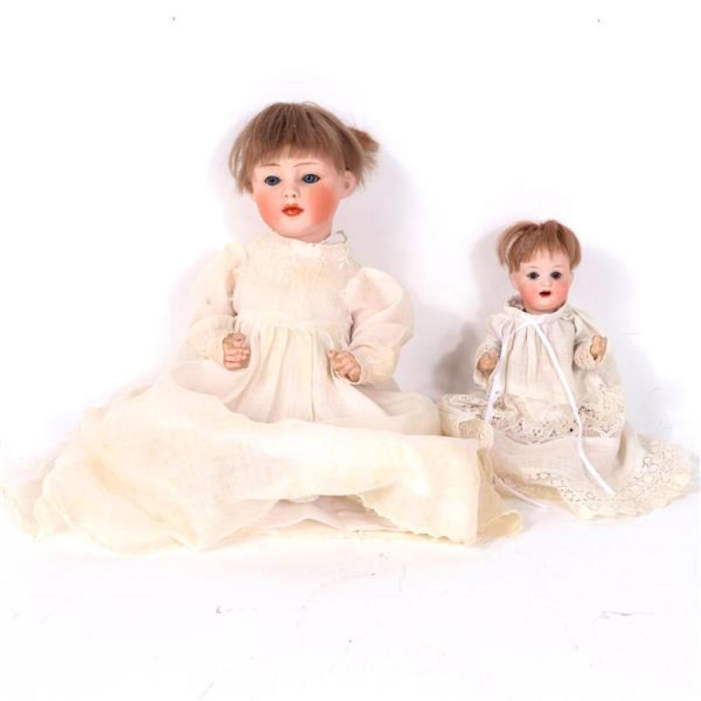 Appraisal: TWO GERMAN BISQUE SOCKET HEAD CHARACTER BABY DOLLS HEUBACH KOPPELSDORF