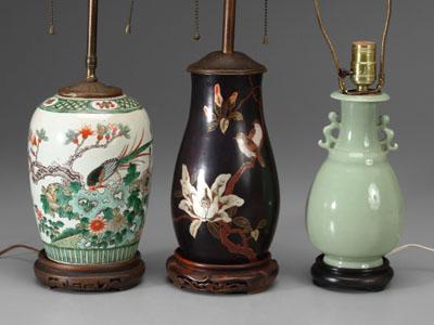 Appraisal: Three Asian vases one Chinese celadon pear-shaped dragon-form flanges banded