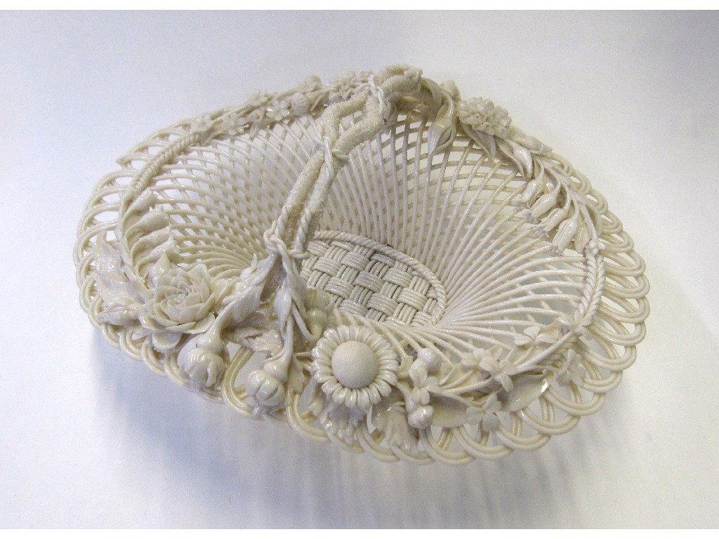 Appraisal: Belleek Henshall basket with four weave base applied flowers and