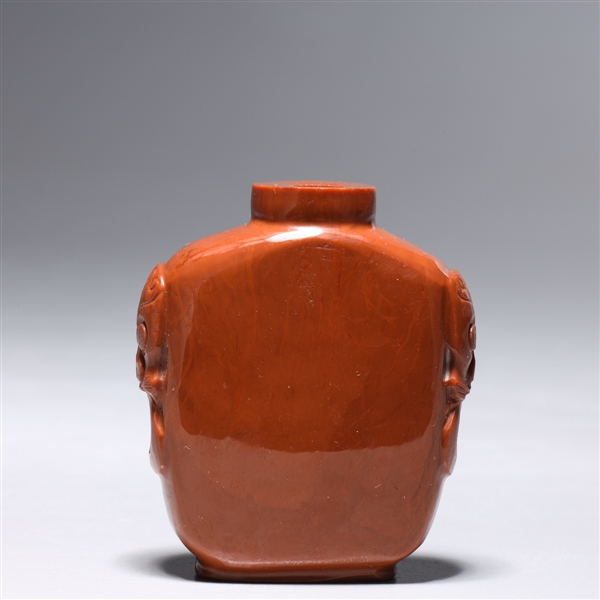 Appraisal: Chinese carved jasper snuff bottle of typical form with archaistic