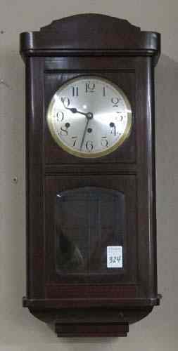 Appraisal: MAHOGANY BOX-CASE WALL CLOCK German Wurttemberg German early th century