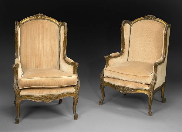 Appraisal: A pair of Louis XV style parcel gilt walnut bergeres