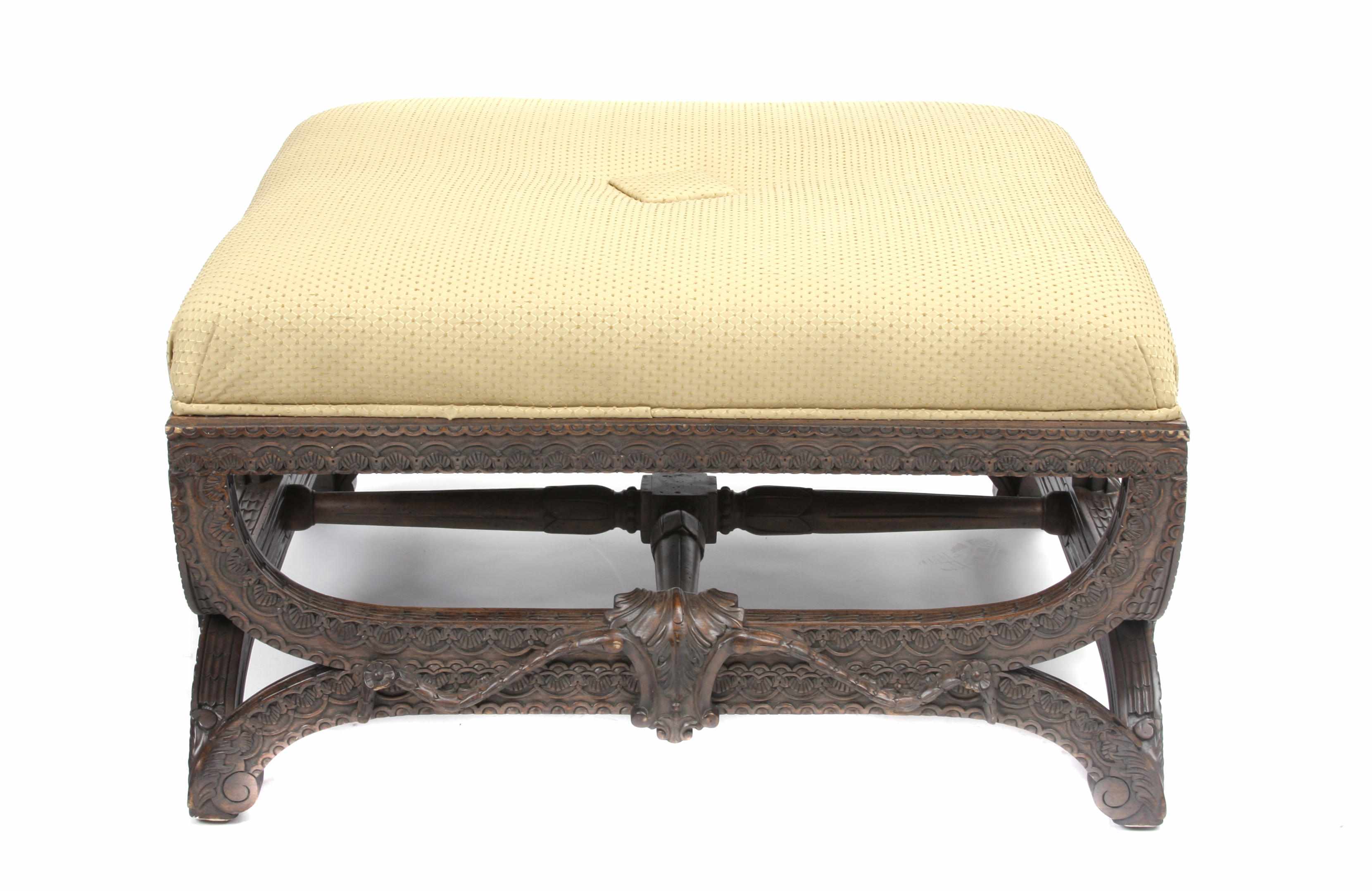 Appraisal: A Neoclassical style carved walnut curule form ottoman height in