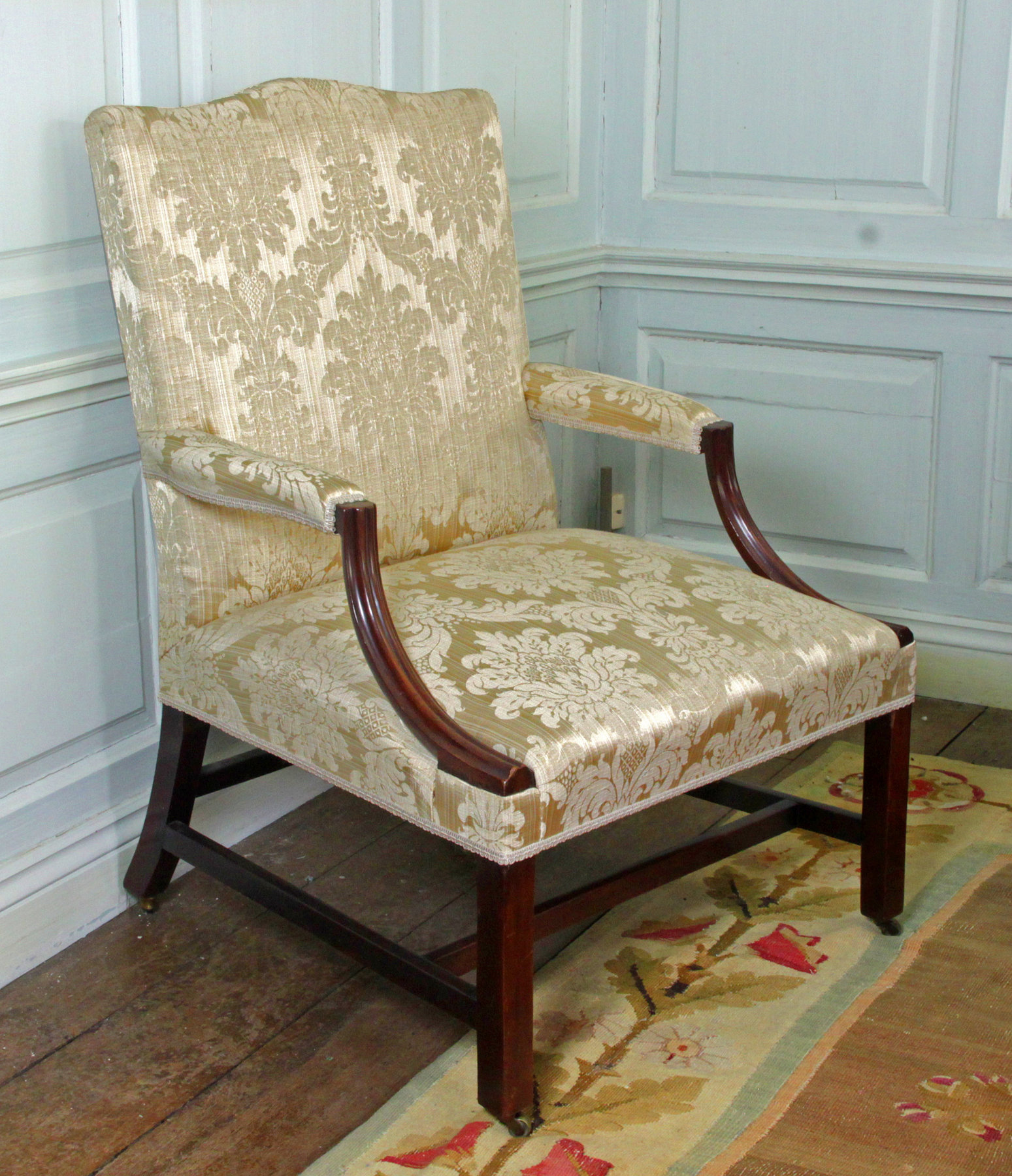 Appraisal: A Gainsborough type armchair with arch top back and moulded