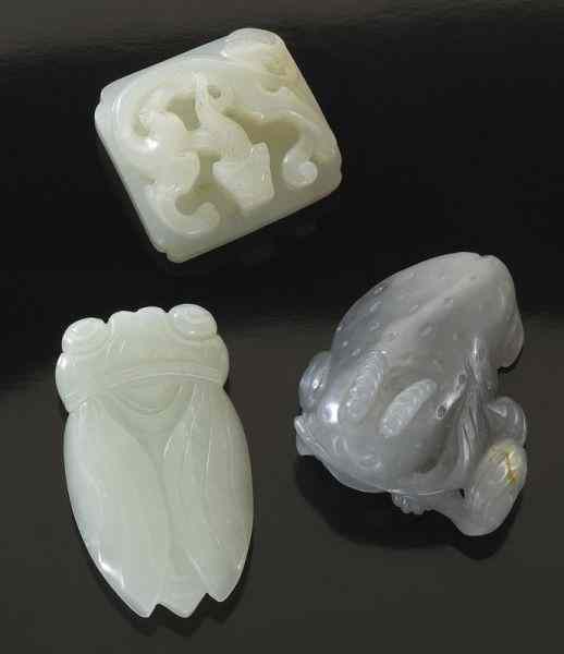 Appraisal: Chinese Qing jade carvings including white jade pendants depicting a