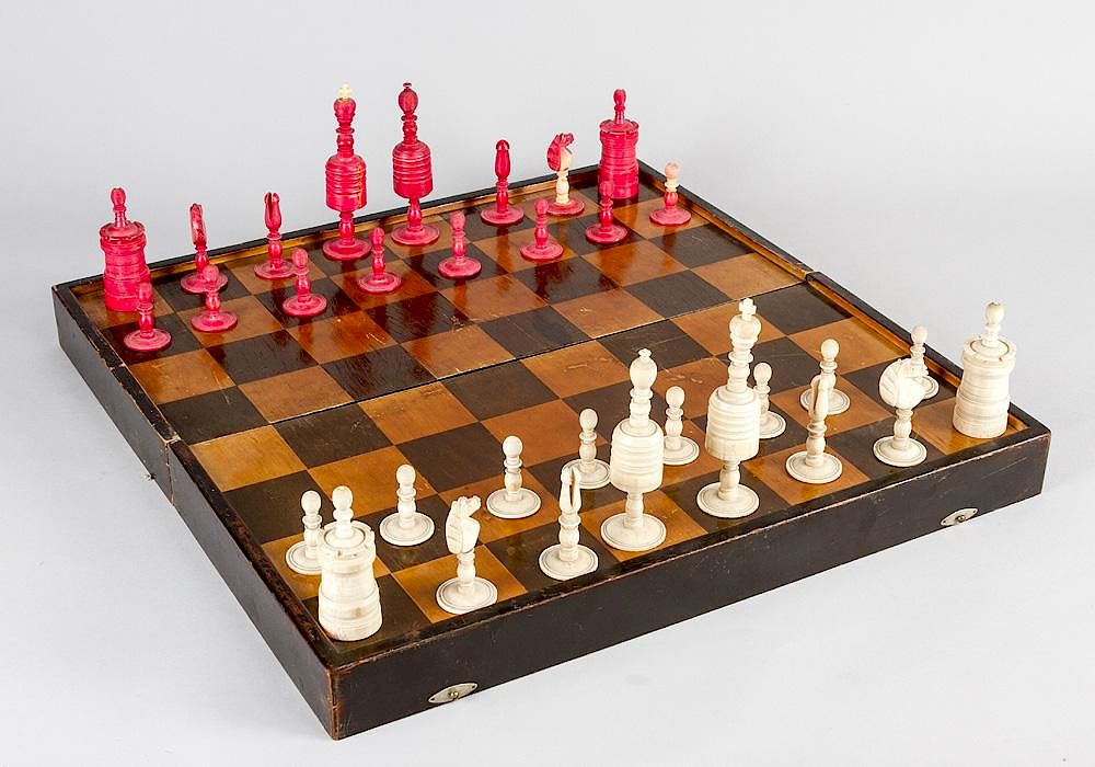 Appraisal: An Angloindian chess set An Anglo-Indian chess set with ivory