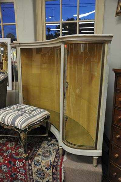 Appraisal: A TH CENTURY FRENCH DEMI LUNE DISPLAY CABINET IN THE