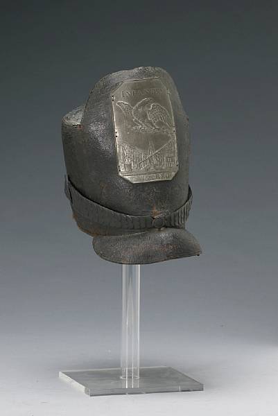 Appraisal: A very rare Pattern Infantry 'tombstone' shako The plate die-struck