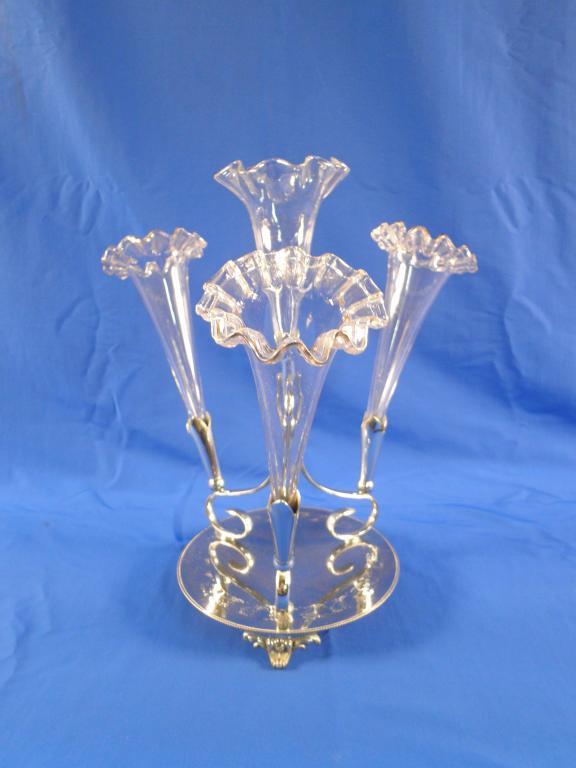 Appraisal: A Victorian glass and silver plated epergne with three trumpet