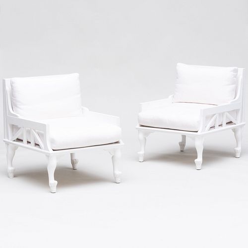 Appraisal: PAIR OF THEBES WHITE PAINTED ARMCHAIRS DESIGNED BY JOHN HUTTON