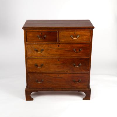 Appraisal: A Georgian mahogany chest of three long and two short