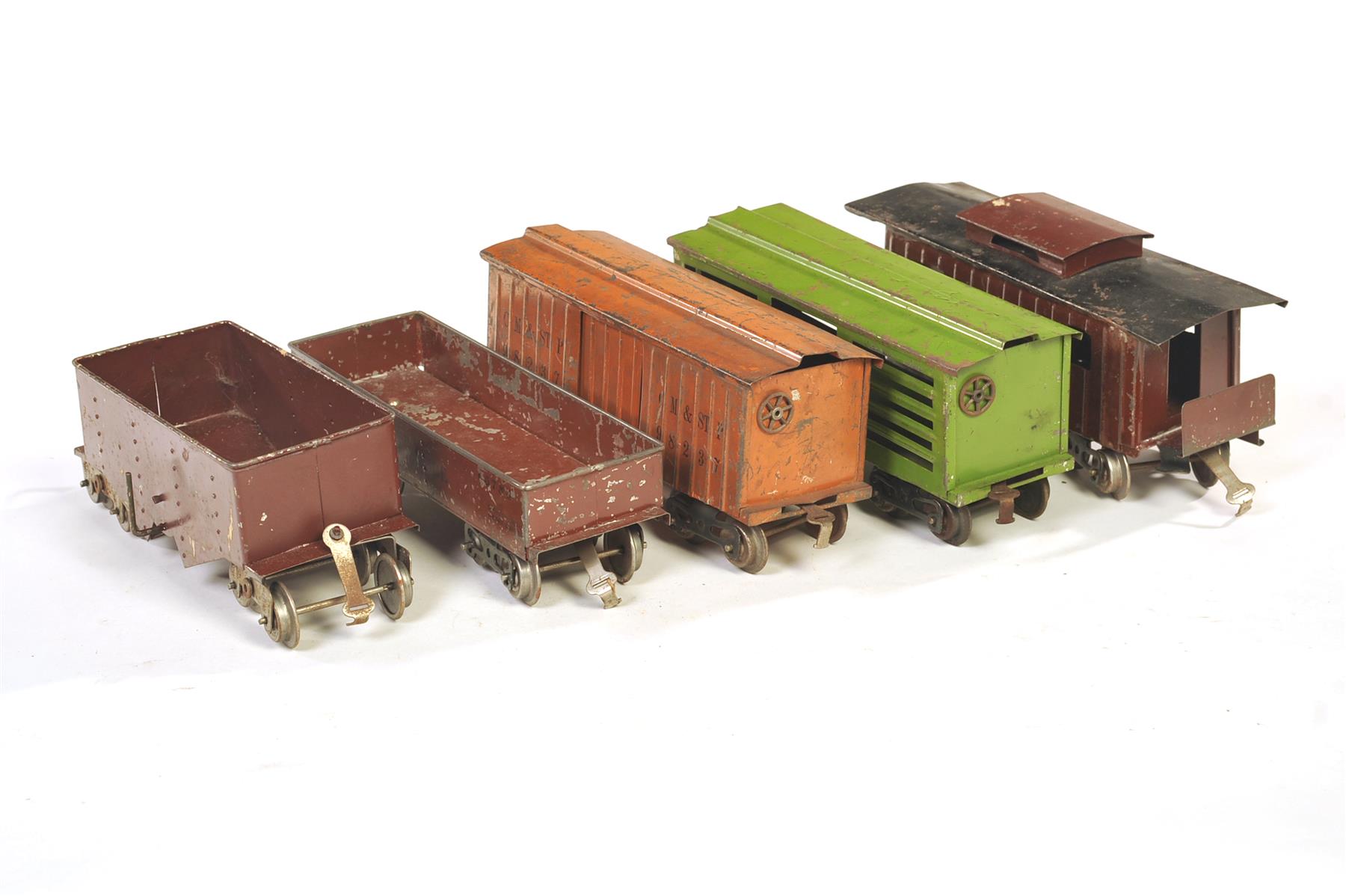 Appraisal: FOUR LIONEL STANDARD GAUGE -SERIES FREIGHT CARS AND ONE -SERIES