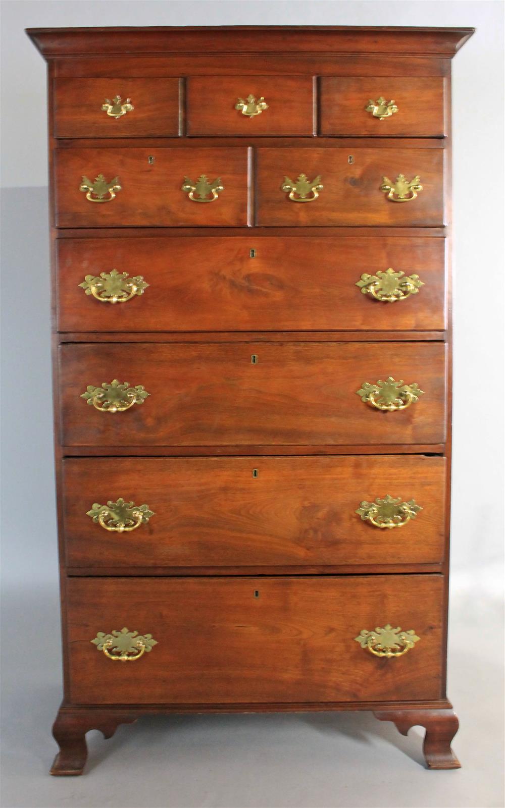 Appraisal: AMERICAN CHIPPENDALE WALNUT TALL CHEST having a rectangular form with