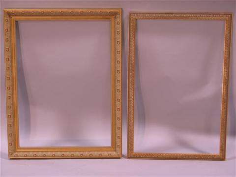 Appraisal: TWO GOLD COLORED WOOD FRAMES The largest - h x