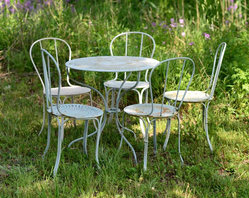 Appraisal: FRENCH PAINTED AND PIERCED METAL BISTRO SET Comprising a circular