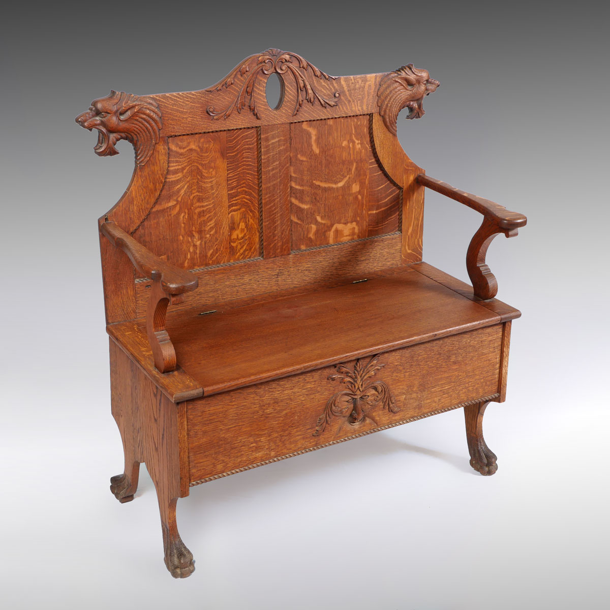 Appraisal: CARVED TIGER OAK BENCH WITH STORAGE Tiger Oak bench with