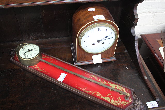 Appraisal: AN EDWARDIAN MAHOGANY CASED MANTLE CLOCK the white dial with