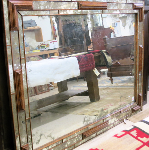 Appraisal: LARGE RECTANGULAR WALL MIRROR featuring a mirror paneled wood frame