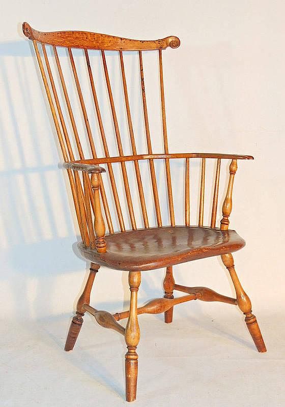 Appraisal: Pennsylvania Comb-back Windsor Armchair th Century Various woods with scrolled