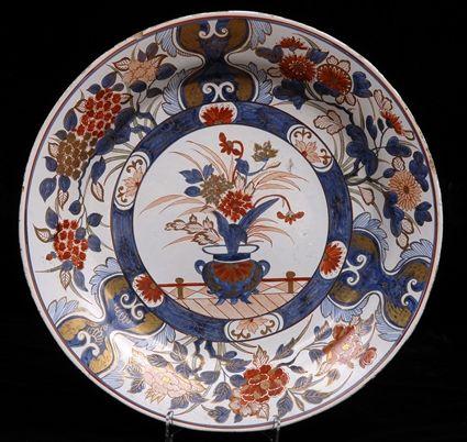 Appraisal: CONTINENTAL TIN-GLAZED EARTHENWARE CHARGER Decorated in the Imari palette with