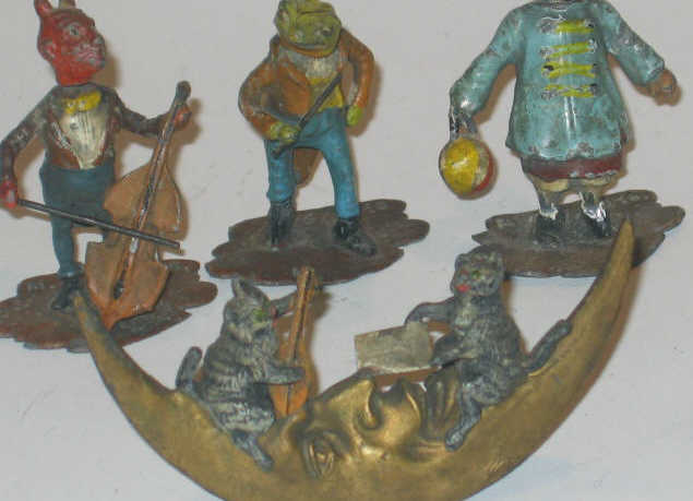 Appraisal: SEVEN COLD PAINTED METAL ANIMAL FIGURES One showing two cats