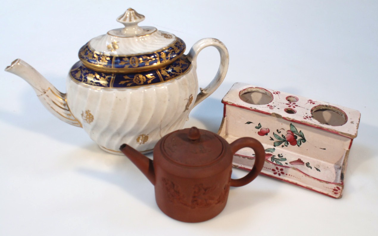 Appraisal: A late thC English redware teapot the cylindrical body raised