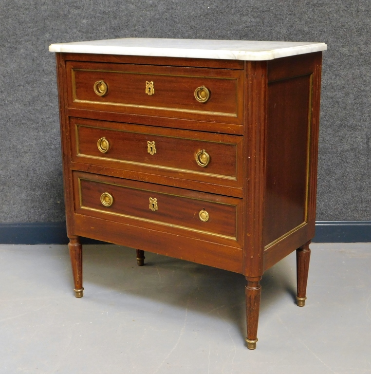 Appraisal: FRENCH DRAWER MARBLE TOP COMMODE France Early th CenturyBeveled edge