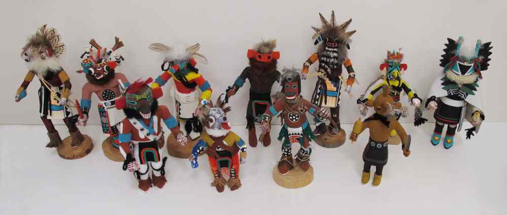 Appraisal: PIECE SOUTHWEST KACHINA DOLL COLLECTION Carved wood decorated with figures