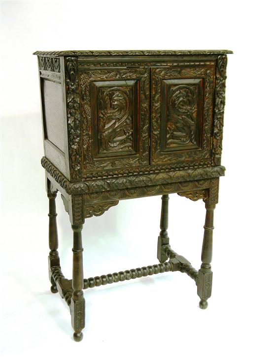 Appraisal: Renaissance style cabinet on stand oak cabinet with rectangular top