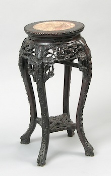 Appraisal: A Carved Rosewood Plant Stand Carved rosewood stand with cabriole